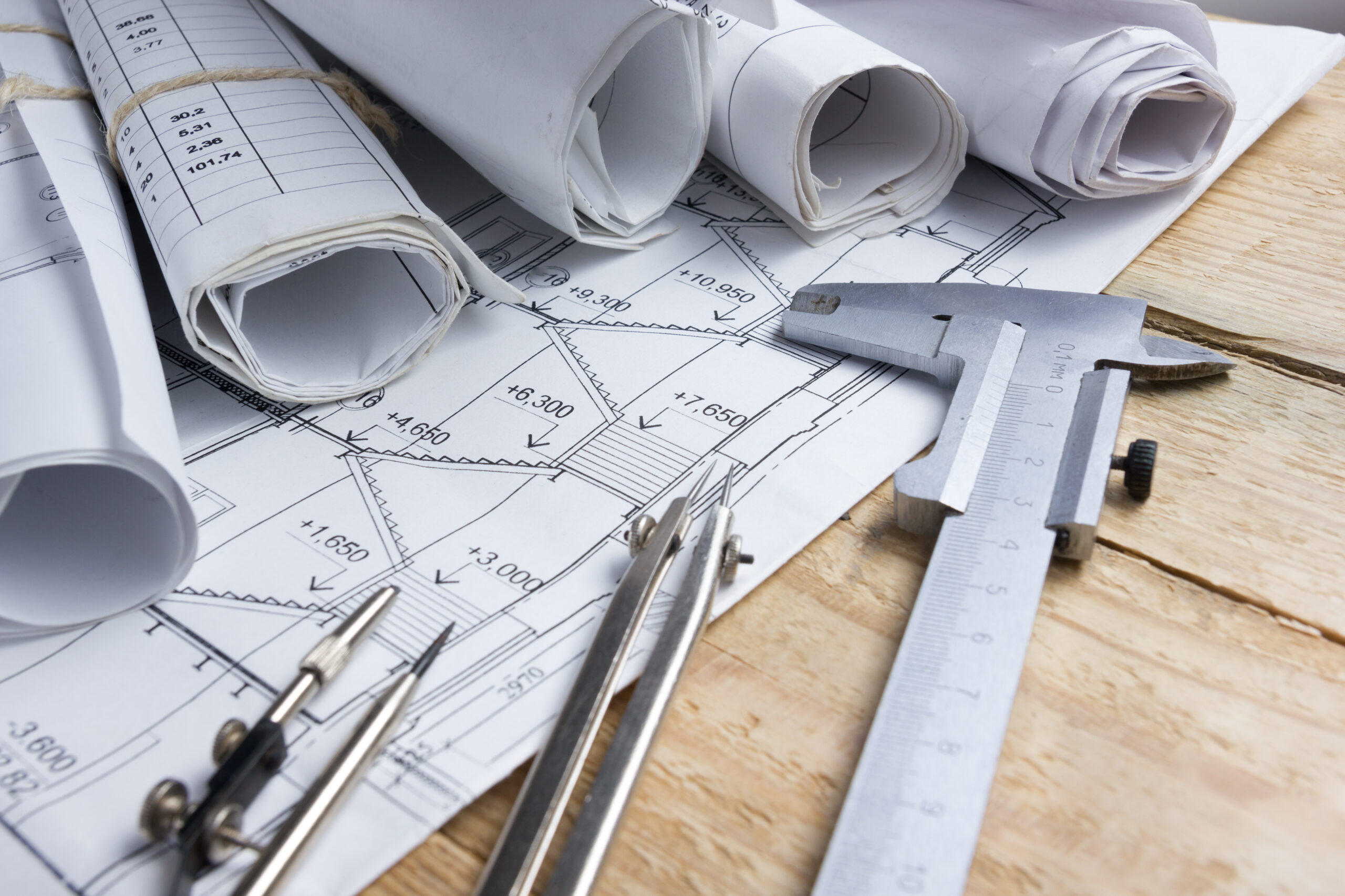Architectural,Project,,Blueprints,,Blueprint,Rolls,And,Divider,Compass,,Calipers,On Architectural,Project,,Blueprints,,Blueprint,Rolls,And,Divider,Compass,,Calipers,On